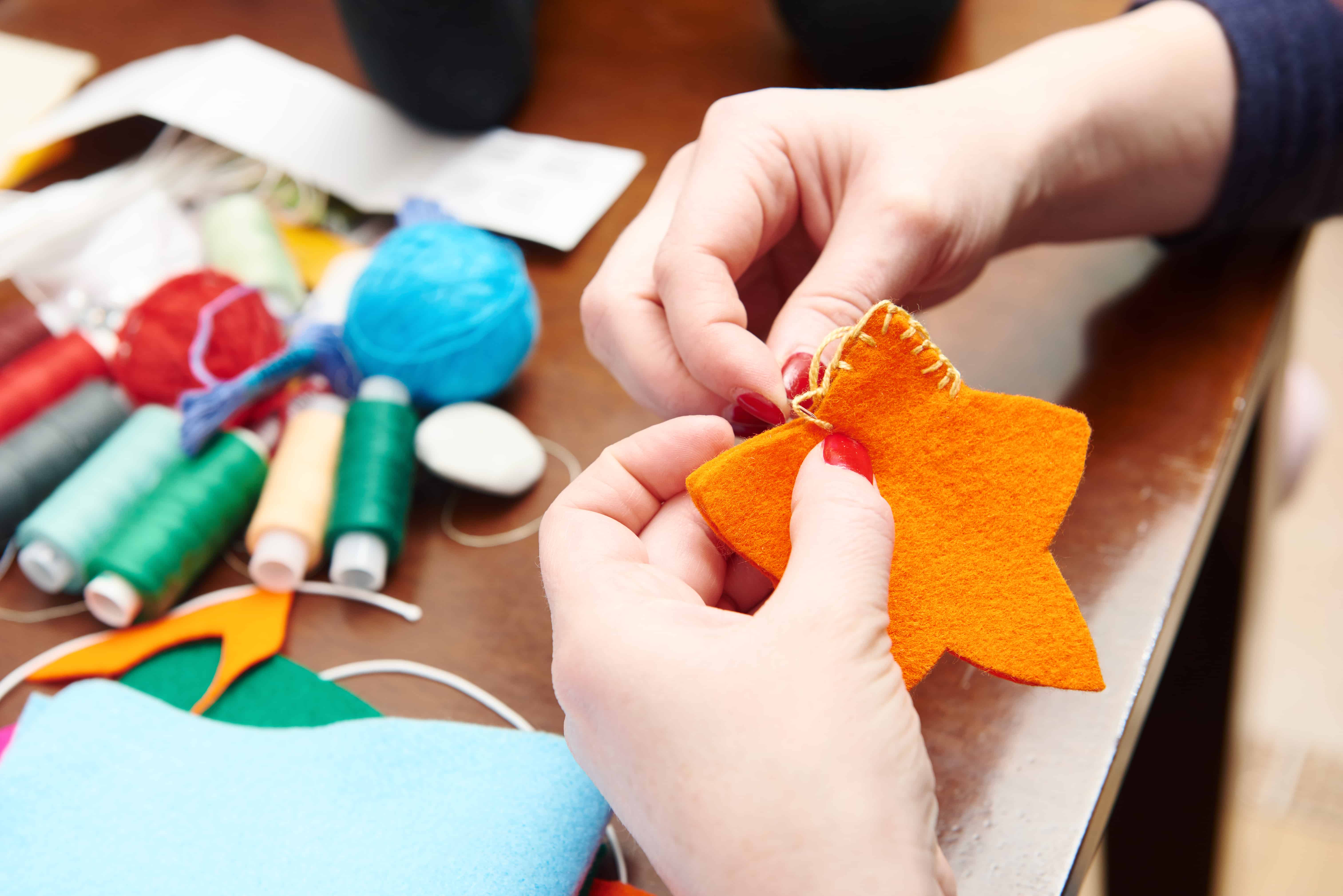 These easy felt ornaments for kids are perfect! Our tree looks gorgeous and we made so many memories! #handmadechristmas #handmade #christmas #tree #ornaments