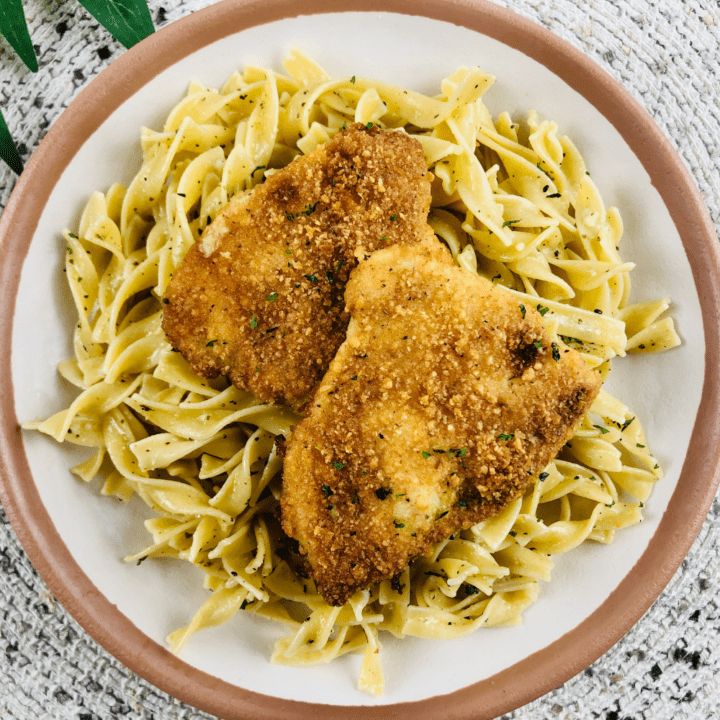 This parmesan crusted chicken with butter noodles is TO DIE FOR! So good and a breeze to make!